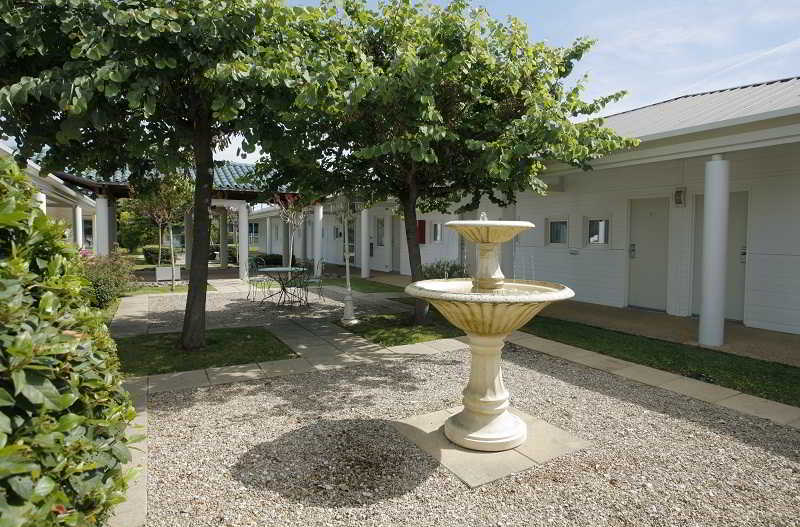 Hotel Grand Confort Le Moulin Rouge Terrasson Exterior foto