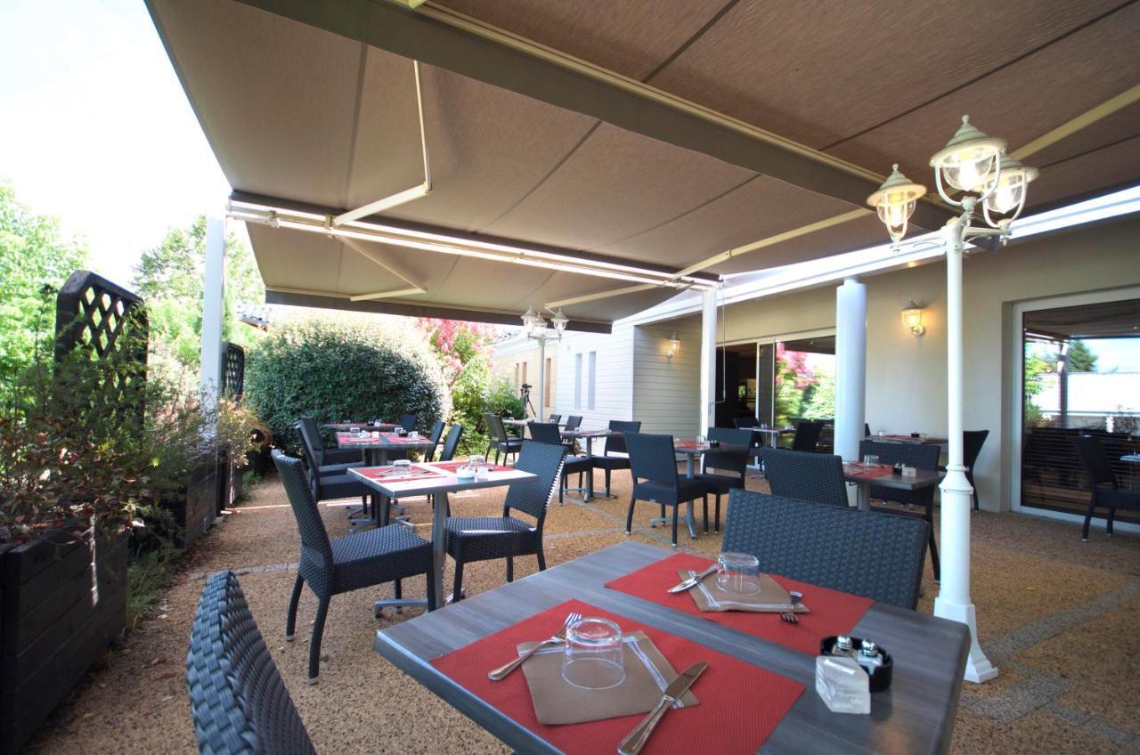 Hotel Grand Confort Le Moulin Rouge Terrasson Exterior foto
